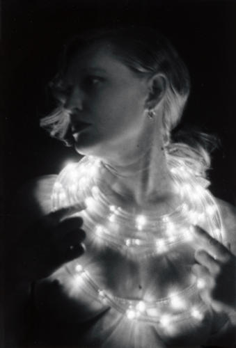 Woman in Light Necklaces (black and white, silver gelatin print)